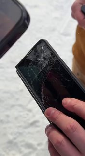 Телефон спас сноубордиста от медведя