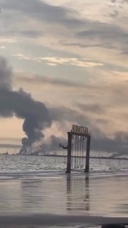 Пожар на базе у Ормуза на фоне кадра с девочкой